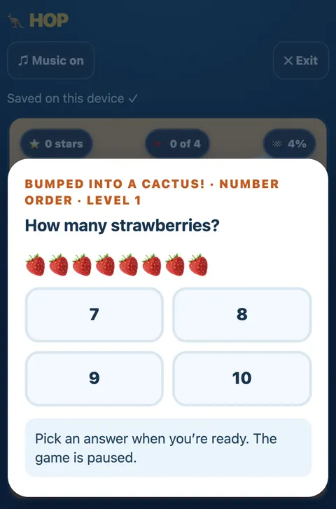 A question card: How many strawberries? with eight strawberries and four answer buttons